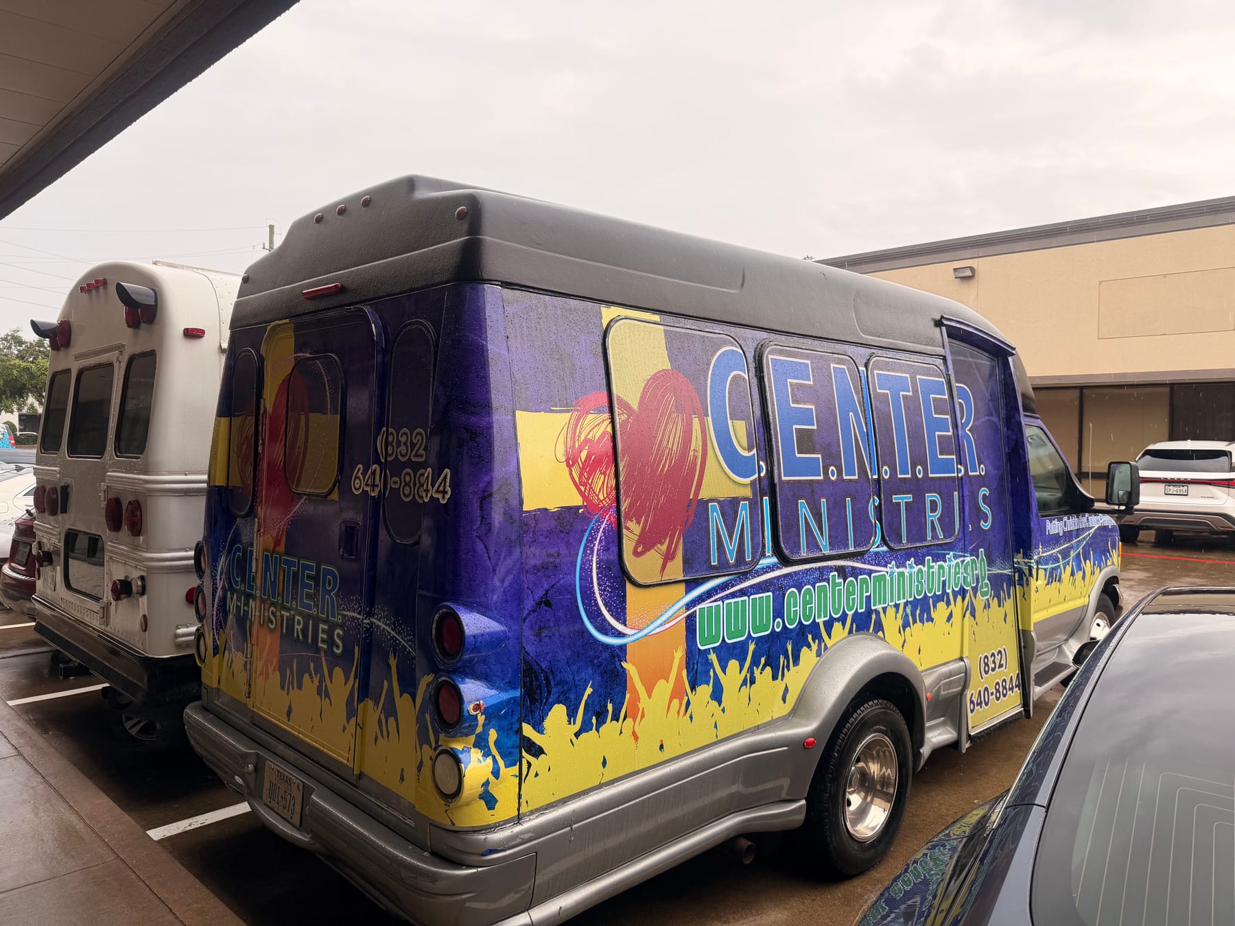 Colorful commercial wrap on a church and ministry shuttle bus
