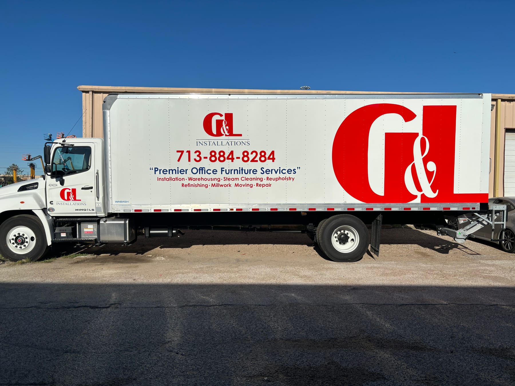 Commercial box truck graphics for a Houston service company